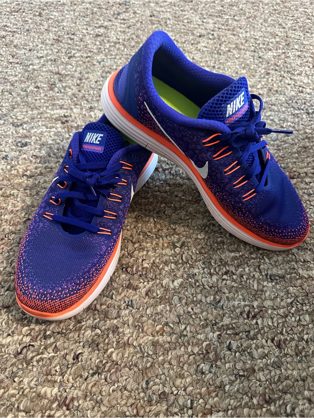 Nike Men’s Athletic Shoes in Deep Blue with Neon Orange Highlights